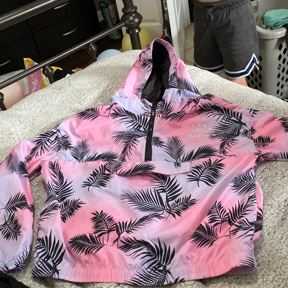 Pink and purple raincoat justice turn into a backpack